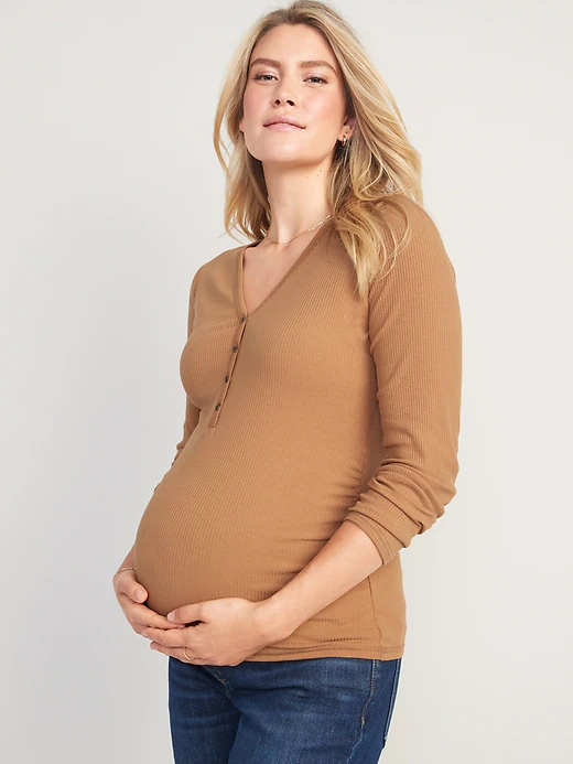 Woman in tan maternity henley shirt 