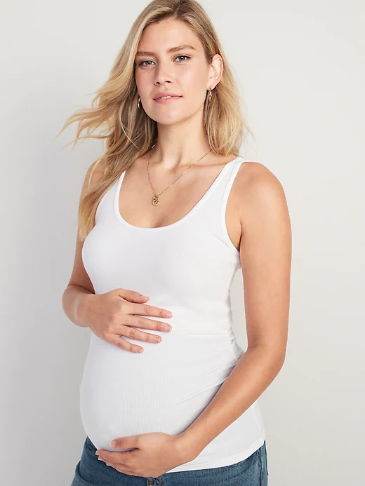 Woman in white maternity tank top 