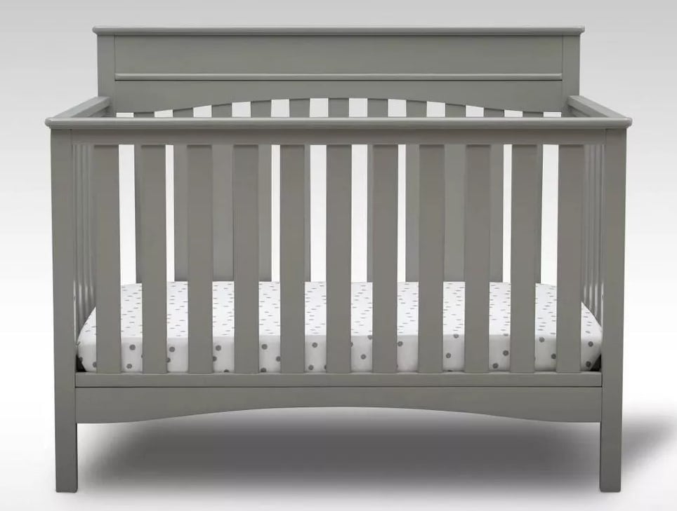 Grey baby crib 