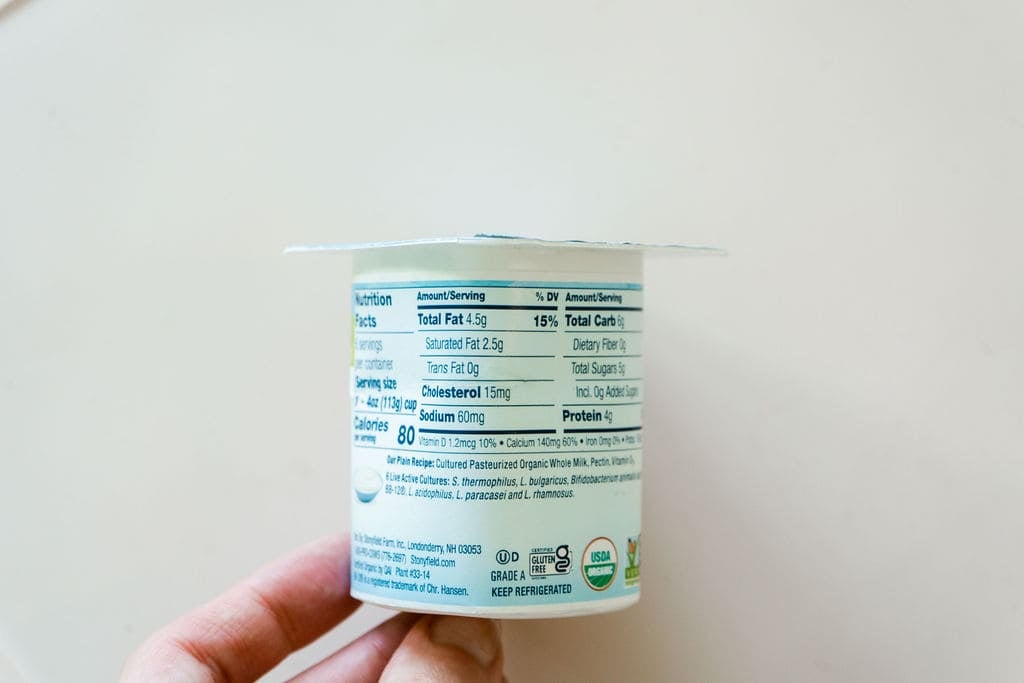 Stonyfield yobaby yogurt cup. We are seeing the nutrition facts - the back of the cup.