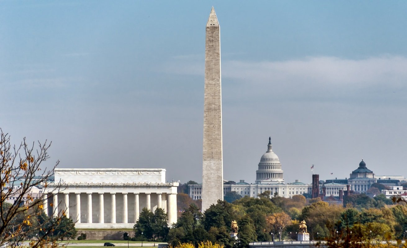 View of Washington DC including three landmark buildings: Washington Monument, Lincoln Memorial and US Congress