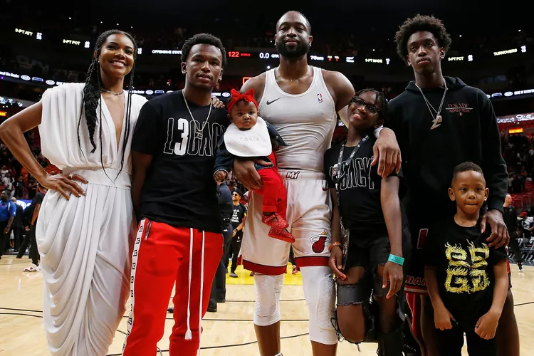 Dwayne Wade and his family on the basketball court