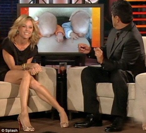 Julie Bowen on the George Lopez show and they have the photo of her breastfeeding her babies in the background
