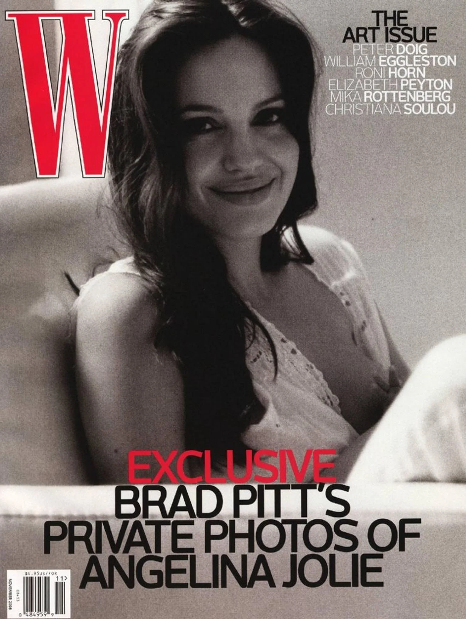 Angelina Jolie on the cover of W Magazine breastfeeding one of her babies.