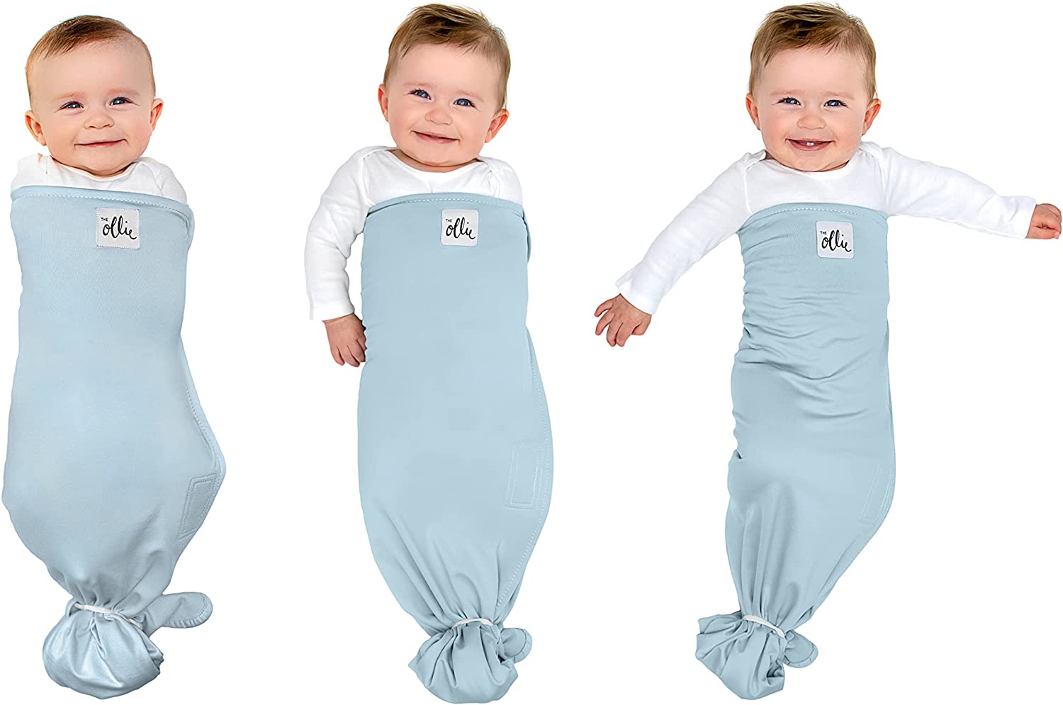 Baby in the Ollie Swaddle in blue