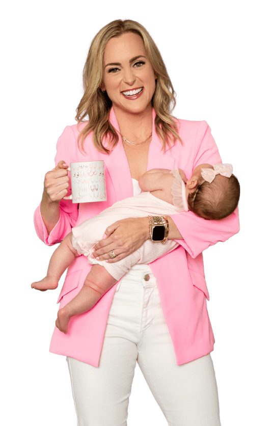 Nina Spears The Baby Chick wearing a pink blazer white pants holding coffee mug in one hand and a young baby in the other