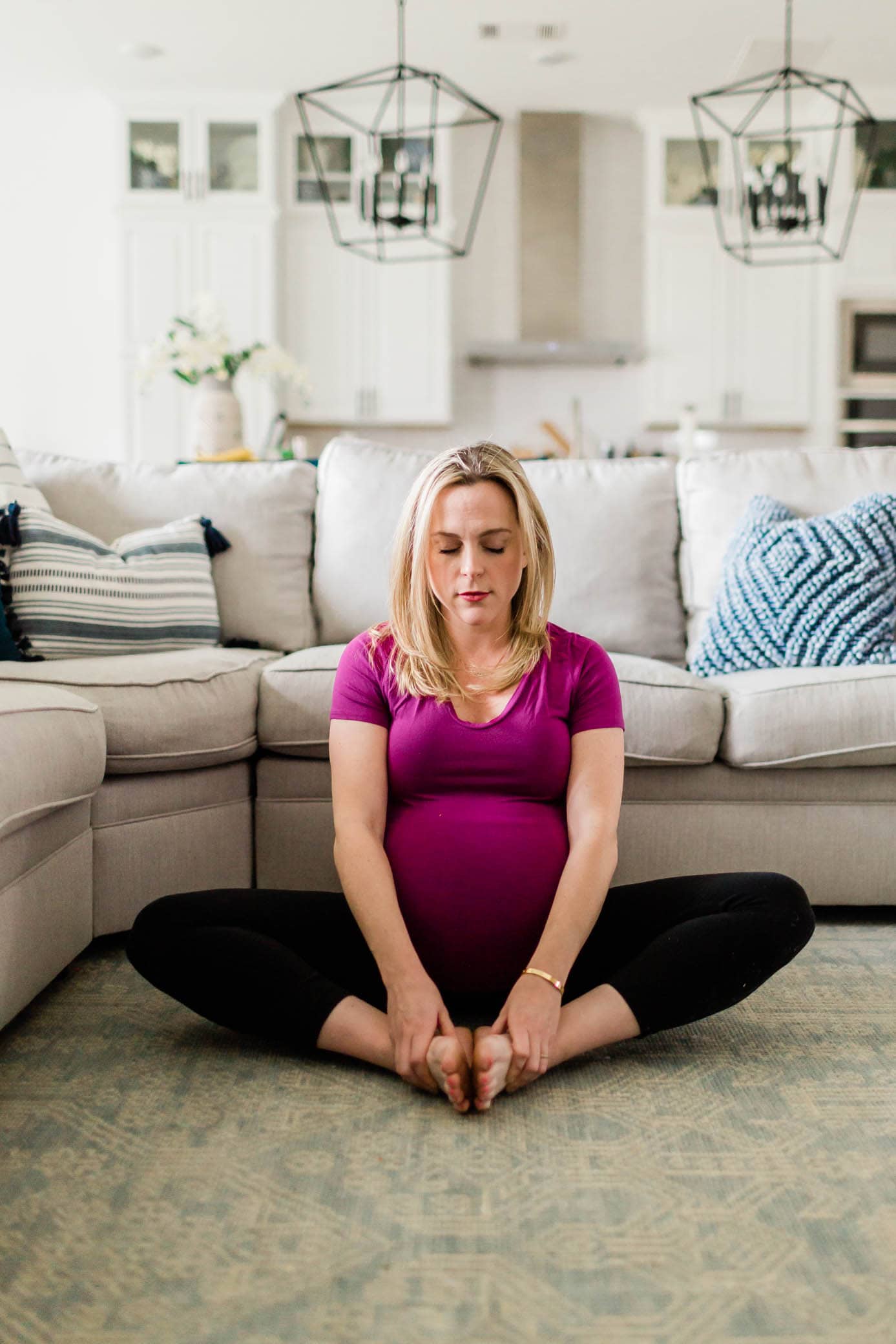 Pregnant woman doing the Bound angle pose