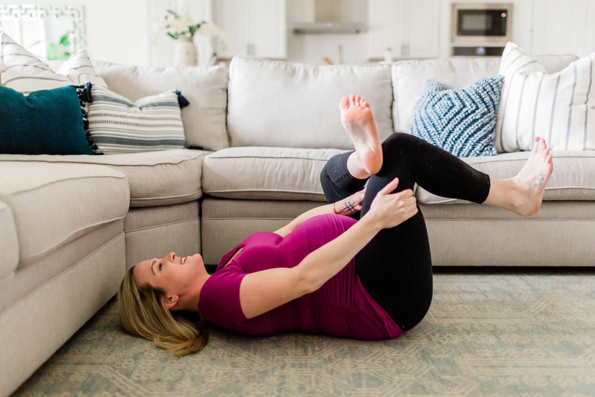 Pregnant woman doing a Figure-Four Stretch