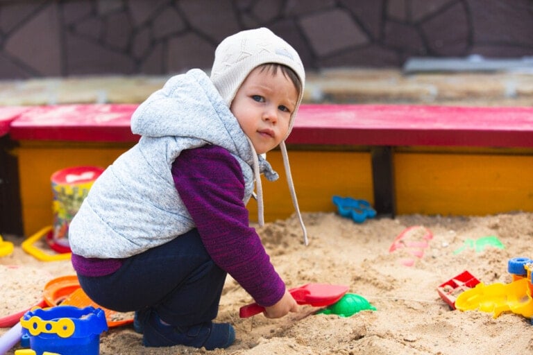 Angry boy play in his sandbox