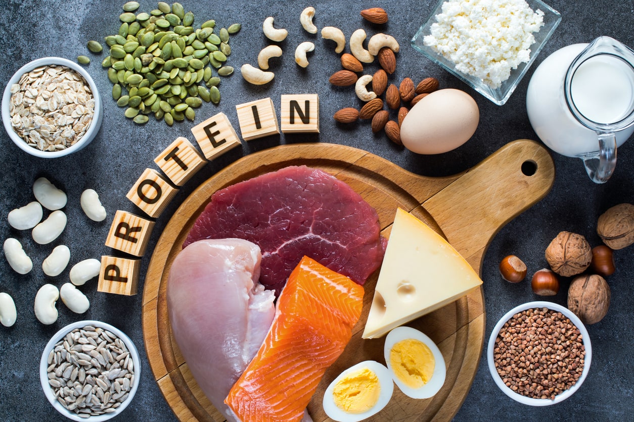High protein food as meat, fish, dairy, eggs, buckwheat, oatmeal, nuts, bean, pumpkin seed and sunflower seed. Top view.