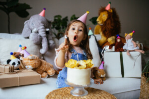 Shot of a happy young girl celebrating her birthday with having party with animal friends