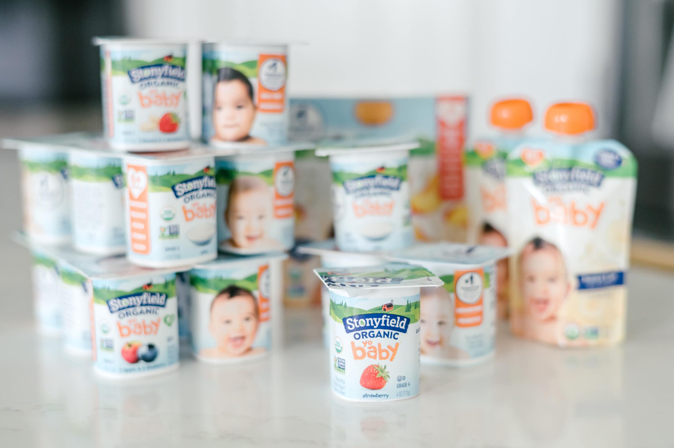 Stonyfield Organic yobaby yogurt on a kitchen counter