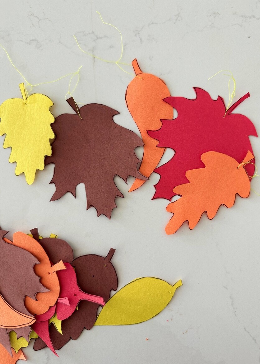 Cut out leaves with string on them
