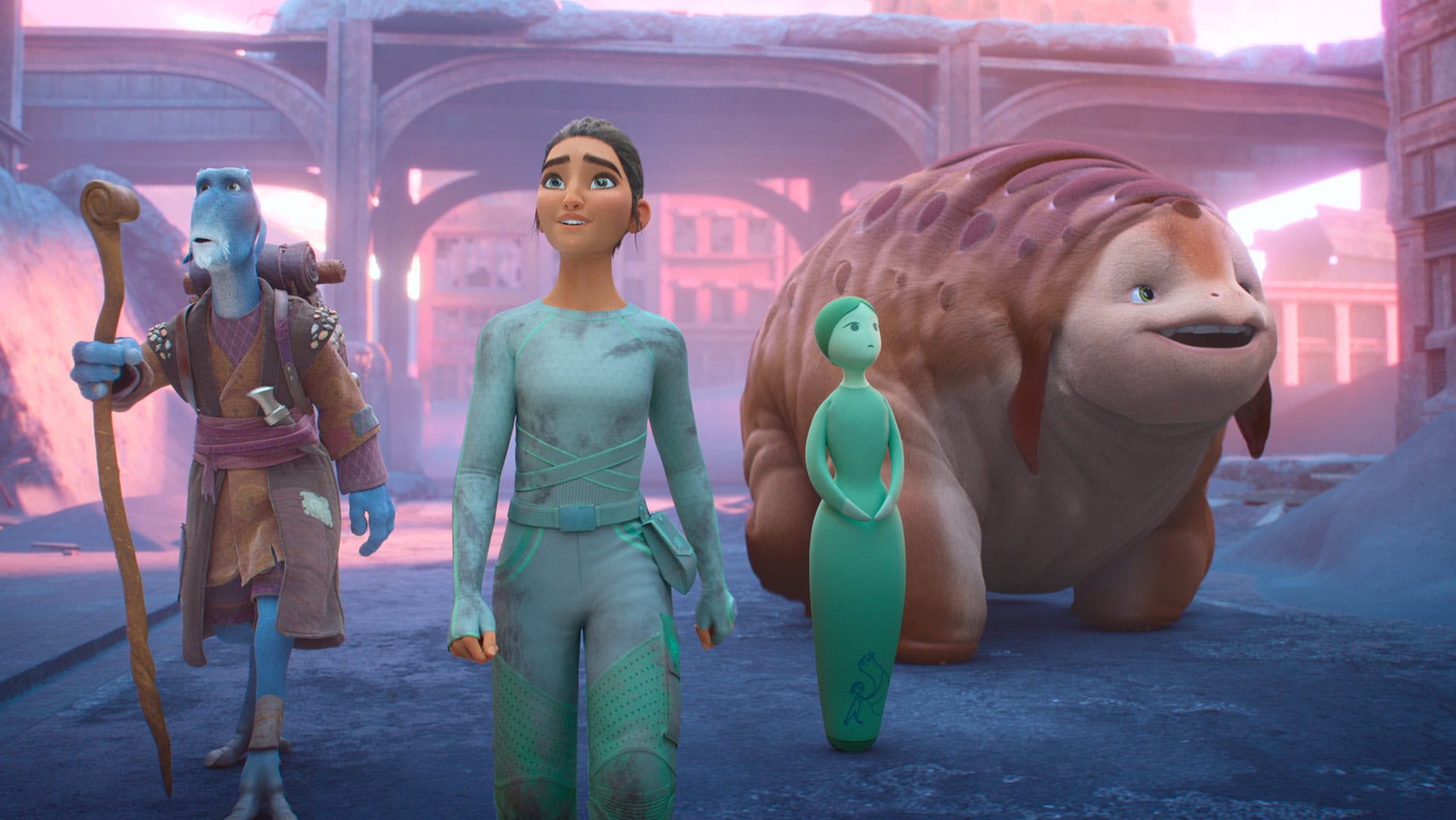 WondLa. Four animated characters stand in front of a large structure with arches and statues. From left to right, there is a blue-skinned humanoid with a staff, a woman in green attire, a small green figure, and a large creature with a smiling face. They all appear to be looking ahead—definitely something for your 'what to watch' list.