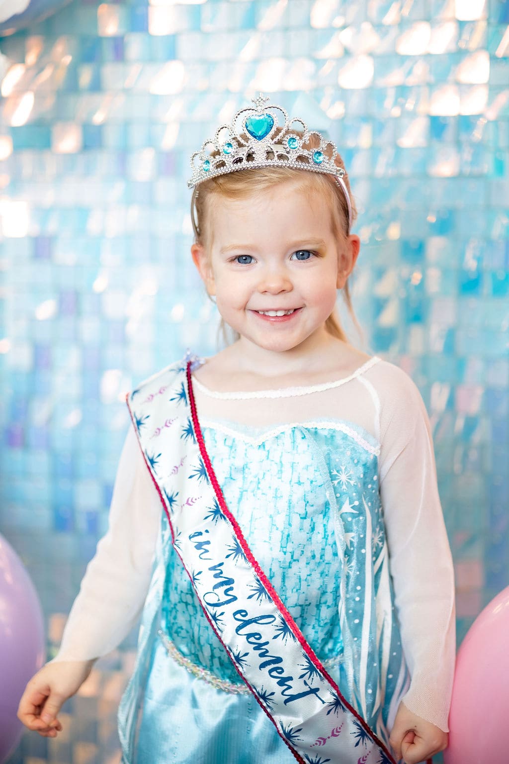 Lily in her Elsa dress at her third Frozen birthday party