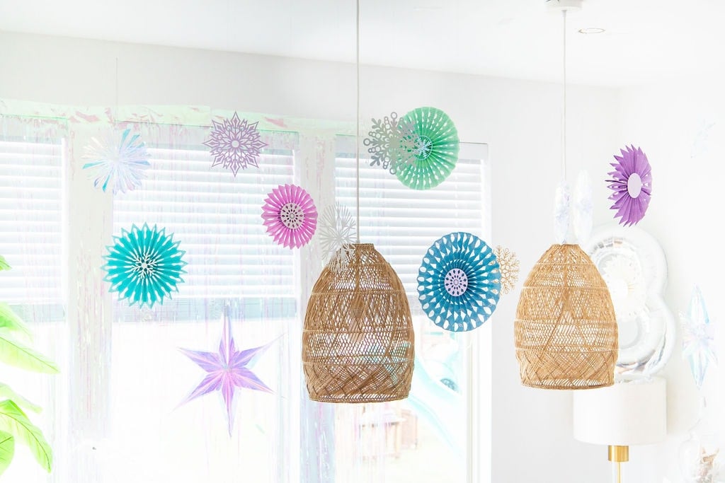 Hanging paper snowflakes for Frozen birthday party