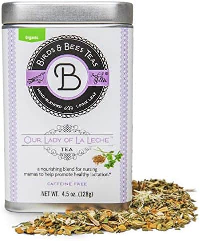 A metal tin labeled Birds & Bees Teas containing Our Lady of La Leche tea is shown. The 4.5 oz (128g) tin is marked as caffeine-free and organic. Loose tea leaves are scattered beside the tin which is one of the postpartum essentials, promoting healthy lactation for postpartum recovery.