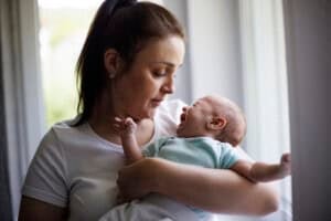 Mother and crying newborn baby